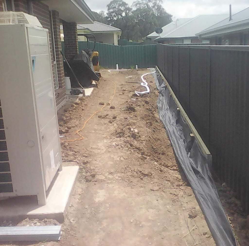 MLC FAB build retaining wall and landscape Hunterview Property